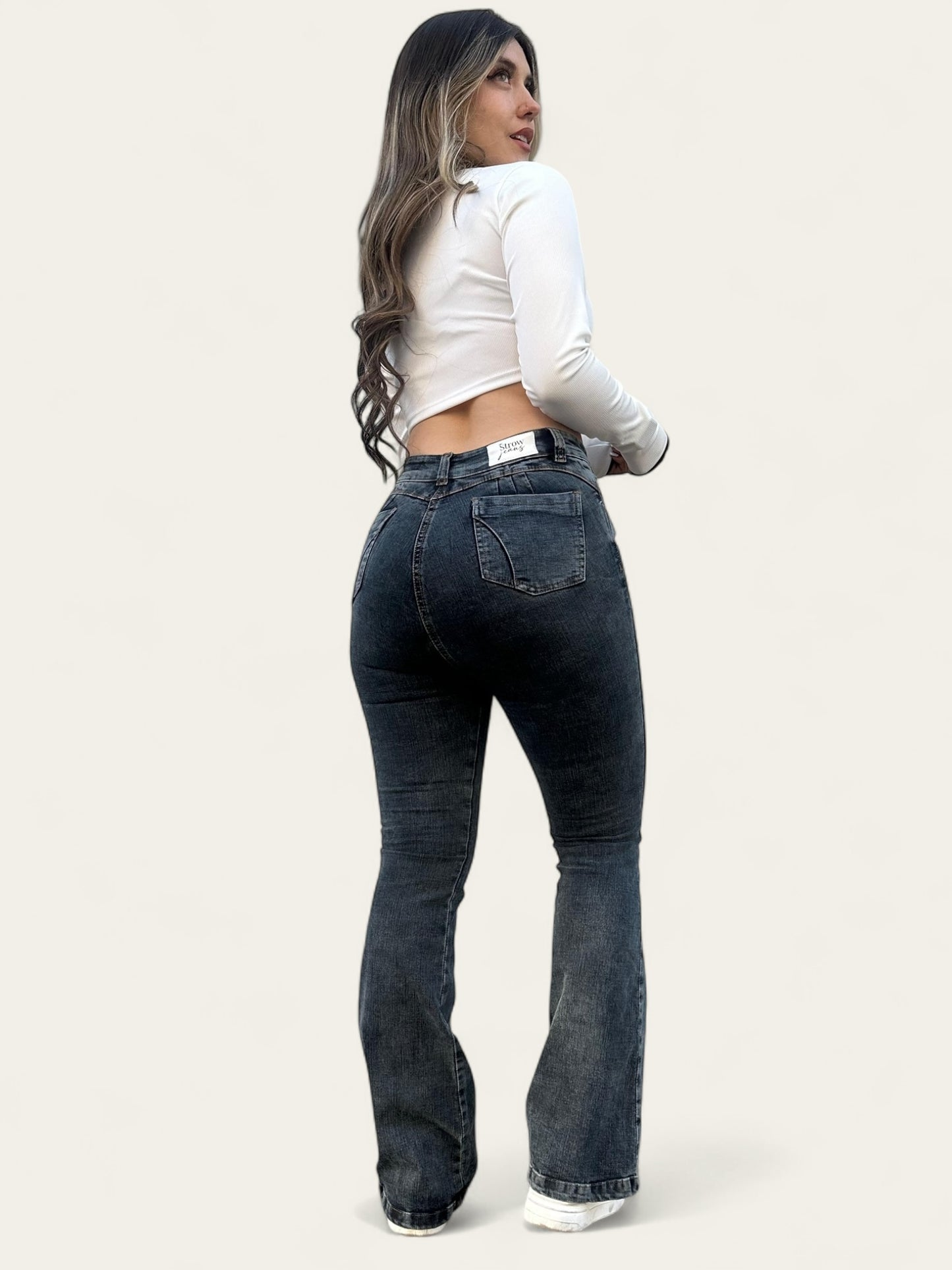 Jean flare mujer tono verdoso