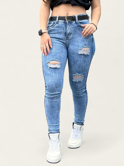 Jean skinny tiro alto levanta cola tono azul claro con rotos