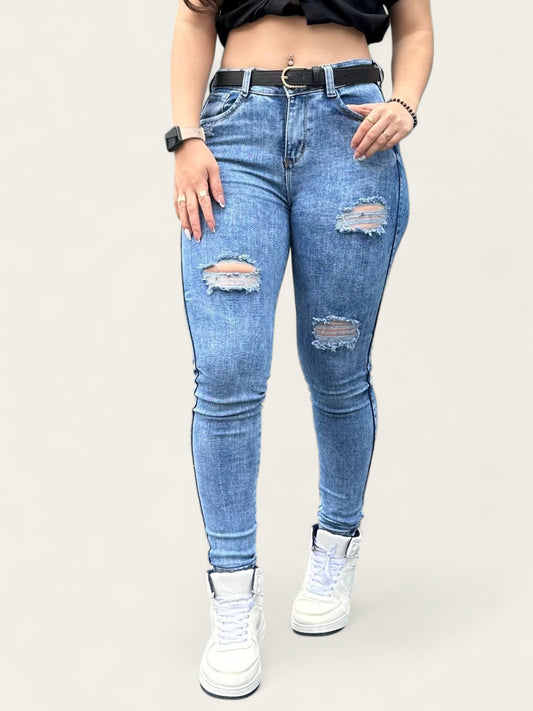 Jean skinny tiro alto levanta cola tono azul claro con rotos