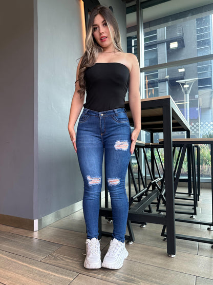 Jean skinny mujer tiro alto levanta cola tono azul oscuro con rotos