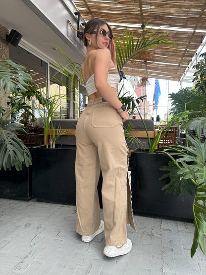 Jean palazzo tono beige con abertura