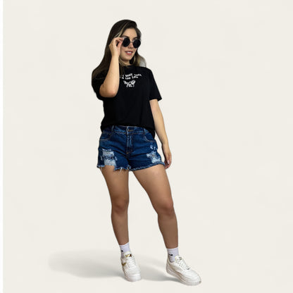 Short en jean Mujer en tono azul con rotos